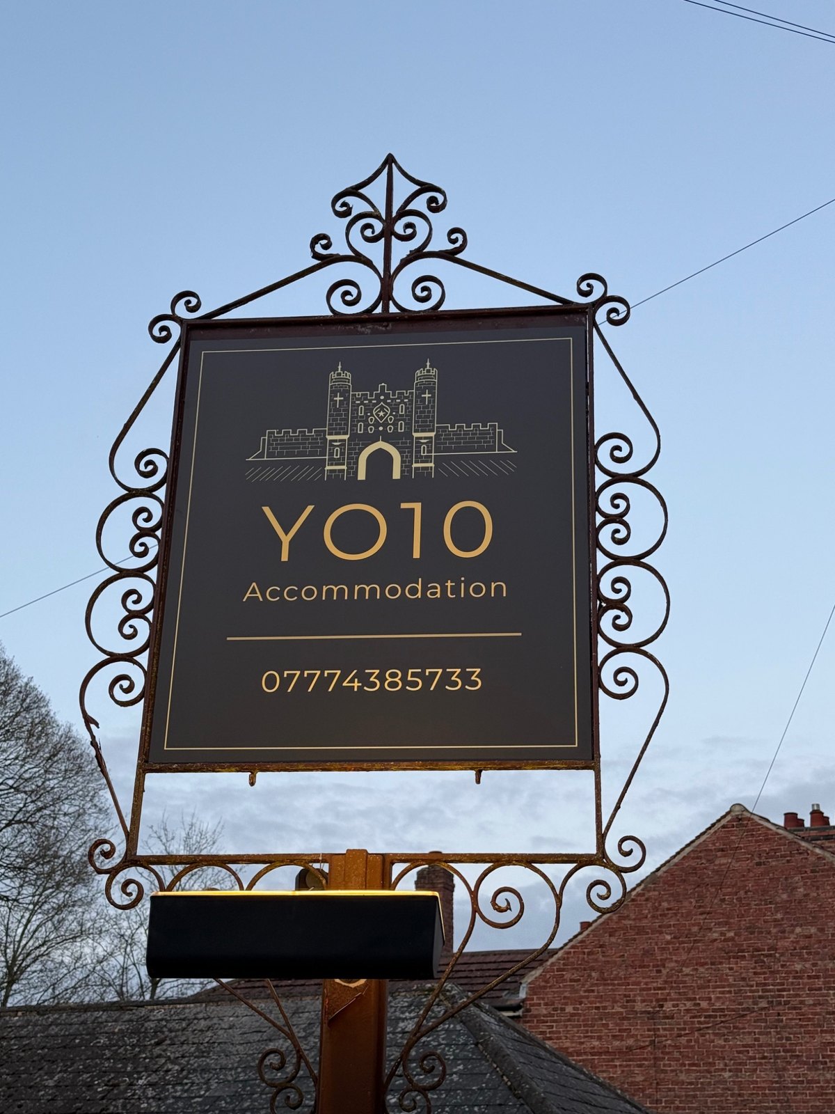 YO10 Accommodation sign with contact number